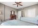 Bedroom featuring two beds, ample closet space, and decorative wood dresser at 345 Bayshore Blvd # 308, Tampa, FL 33606