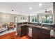Open kitchen featuring granite countertops, stainless appliances, and a seamless flow to the living spaces at 345 Bayshore Blvd # 308, Tampa, FL 33606