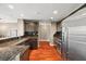 Modern kitchen featuring stainless steel appliances, granite countertops, and ample cabinet space at 345 Bayshore Blvd # 308, Tampa, FL 33606