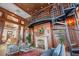 This elegant living room features a spiral staircase, fireplace, and wood paneled walls at 345 Bayshore Blvd # 308, Tampa, FL 33606