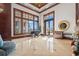 Elegant lobby with high ceilings, grand piano, and large windows at 345 Bayshore Blvd # 308, Tampa, FL 33606