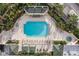 Luxury pool area with plenty of lounge chairs, surrounding foliage, and a spa at 345 Bayshore Blvd # 308, Tampa, FL 33606