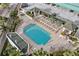 Resort style pool features lush landscaping, outdoor furniture, and covered seating areas at 345 Bayshore Blvd # 308, Tampa, FL 33606
