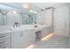 Elegant bathroom with double vanity, soaking tub and shower at 455 Pinellas Bayway S # 3B, Tierra Verde, FL 33715