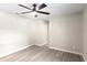 Clean and spacious bedroom featuring wood-look floors and neutral walls at 615 W Virginia Ave, Tampa, FL 33603