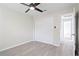 Bedroom with a modern ceiling fan, closet and luxury vinyl plank flooring at 615 W Virginia Ave, Tampa, FL 33603
