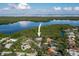 Stunning aerial view showcases the property's proximity to water, lush greenery, and neighborhood at 7255 18Th Ne St, St Petersburg, FL 33702