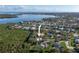 Aerial view of waterfront home in a quiet neighborhood at 7255 18Th Ne St, St Petersburg, FL 33702
