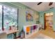 Bedroom featuring a window providing lots of natural light, a large closet, and colorful decorations at 7255 18Th Ne St, St Petersburg, FL 33702