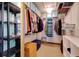 Organized walk-in closet with shelving, hanging rods, and ample storage space at 7255 18Th Ne St, St Petersburg, FL 33702