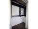 Walk-in closet with double hanging rods at 1042 Idlewild N Dr, Dunedin, FL 34698