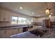 Bright kitchen with stainless steel appliances and granite countertops at 1042 Idlewild N Dr, Dunedin, FL 34698