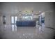 Stylish kitchen boasting a sizable island and modern finishes at 1042 Idlewild N Dr, Dunedin, FL 34698