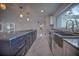 Modern kitchen with stainless steel sink and granite countertops at 1042 Idlewild N Dr, Dunedin, FL 34698