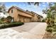 Three car garage with covered entry and beautiful landscaping at 12709 Mannhurst Oak Ln, Lithia, FL 33547