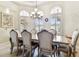 Formal dining room with large table and chairs at 12709 Mannhurst Oak Ln, Lithia, FL 33547