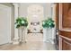 Bright and spacious entryway with seating area at 12709 Mannhurst Oak Ln, Lithia, FL 33547