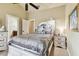 Charming bedroom with a queen bed and en-suite bathroom access at 12709 Mannhurst Oak Ln, Lithia, FL 33547