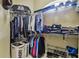 Large walk-in closet with ample shelving and hanging space at 12709 Mannhurst Oak Ln, Lithia, FL 33547