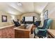 Home theater with projector, screen, and comfortable seating at 12709 Mannhurst Oak Ln, Lithia, FL 33547