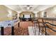 Game room with foosball table and bar area at 12709 Mannhurst Oak Ln, Lithia, FL 33547