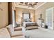 Bright bedroom with a comfy bed and plenty of natural light at 12709 Mannhurst Oak Ln, Lithia, FL 33547