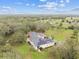 Home with solar panels and a large backyard on a spacious lot at 12709 Mannhurst Oak Ln, Lithia, FL 33547