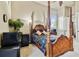 Bedroom with king-size bed, and en-suite bathroom at 12709 Mannhurst Oak Ln, Lithia, FL 33547