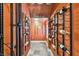 A walk-in wine cellar with plenty of space for your collection at 12709 Mannhurst Oak Ln, Lithia, FL 33547