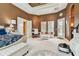 Primary bedroom with sitting area and private access at 12709 Mannhurst Oak Ln, Lithia, FL 33547