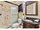 Bathroom with a shower, toilet and vanity with granite countertop at 12709 Mannhurst Oak Ln, Lithia, FL 33547