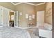 Main bedroom with sitting area and access to other rooms at 12709 Mannhurst Oak Ln, Lithia, FL 33547