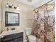 Clean bathroom with shower/tub combo and updated vanity at 12916 Fieldmoor Ct, Riverview, FL 33569