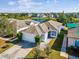 Aerial view of charming house with lake view at 12916 Fieldmoor Ct, Riverview, FL 33569