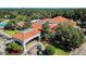 Community clubhouse with pool, tennis courts, and golf course views at 13141 Palmilla Cir, Dade City, FL 33525