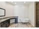 Elegant bathroom with freestanding tub, granite vanity, and shower at 13141 Palmilla Cir, Dade City, FL 33525