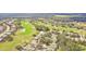 Aerial view of community by golf course at 13141 Palmilla Cir, Dade City, FL 33525