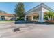 Elegant clubhouse entrance with covered portico at 13141 Palmilla Cir, Dade City, FL 33525