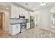 Modern kitchen with stainless steel appliances and granite countertops at 13141 Palmilla Cir, Dade City, FL 33525