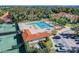 Community pool and tennis courts near parking at 13141 Palmilla Cir, Dade City, FL 33525