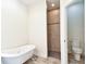 Bathroom with a clawfoot tub and a separate shower at 13141 Palmilla Cir, Dade City, FL 33525