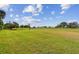 Picturesque view of a golf course on a sunny day at 13141 Palmilla Cir, Dade City, FL 33525