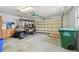 Garage with golf cart and ample storage space at 13141 Palmilla Cir, Dade City, FL 33525