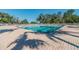 Inviting community pool with lounge chairs and patio area at 13141 Palmilla Cir, Dade City, FL 33525