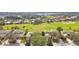 Aerial view of homes and golf course at 13141 Palmilla Cir, Dade City, FL 33525