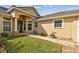 Front entry with walkway, landscaping, and columns at 13141 Palmilla Cir, Dade City, FL 33525