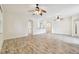 Bright and airy living room with high ceilings and wood floors at 13141 Palmilla Cir, Dade City, FL 33525