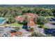 Community clubhouse with red tile roof at 13141 Palmilla Cir, Dade City, FL 33525