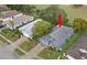 Aerial view showcasing the home's curb appeal and neighborhood at 13229 Golf Ridge Pl, Hudson, FL 34669