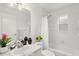 Clean bathroom with tub, shower, and updated vanity at 13229 Golf Ridge Pl, Hudson, FL 34669
